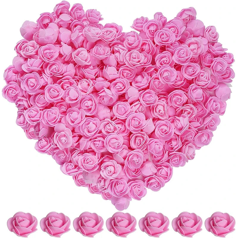 Decoración con forma de corazón hecha de flores de espuma de rosa artificial rosa.