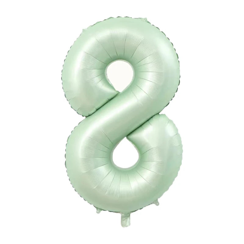 A light mint green foil number balloon shaped like the number 8.