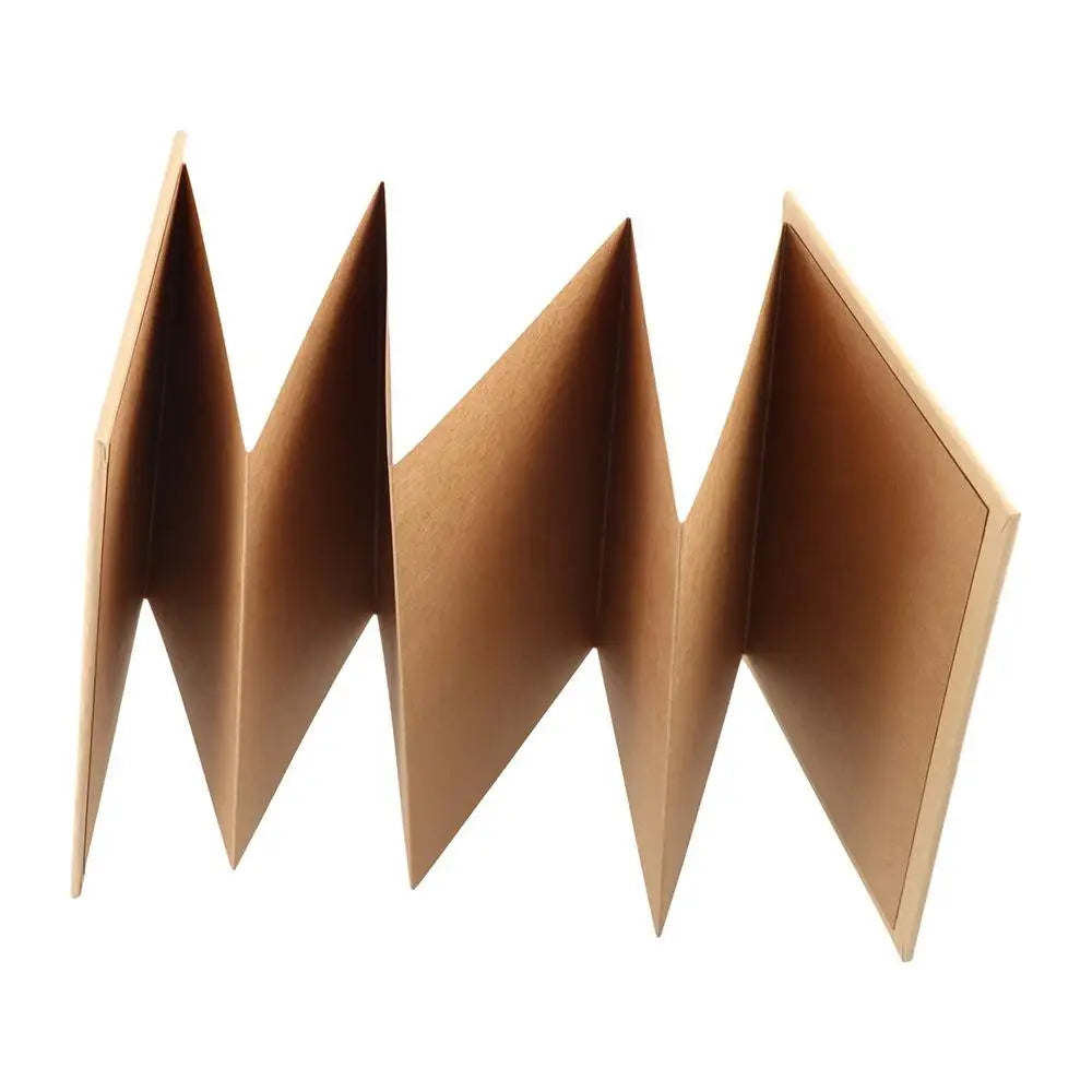 A handcrafted accordion photo album in a light brown or tan color, shown open and folded.