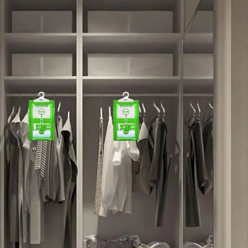 A row of hanging moisture absorber bags displayed in a closet or wardrobe shelving unit.