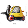 Yellow construction truck foil balloon model with black details and wheels, shown from the side.