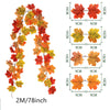 Artificial autumn maple leaf vine wreath featuring red, orange, and yellow leaves.