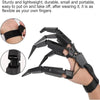 Black articulated skeleton hand gloves worn on a wrist.