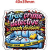 A die-cut sticker featuring the text True Crime Detective Couch Division on a blue background with red accents.