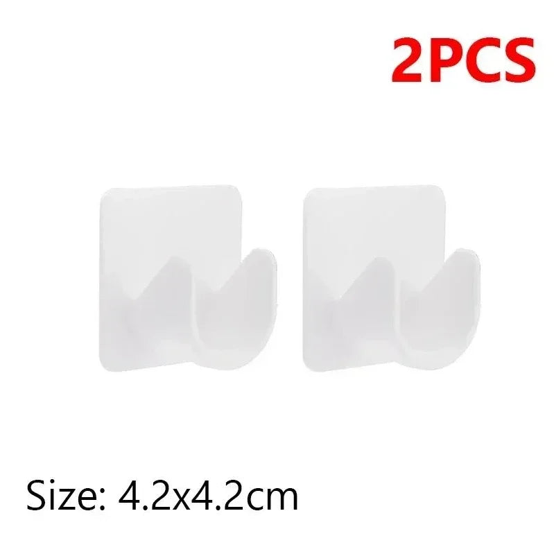 Two white adjustable self-adhesive curtain rod brackets for walls, measuring 4.2x4.2cm each.