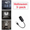 A Halloween LED projection lamp set featuring a light source and a handprint design.