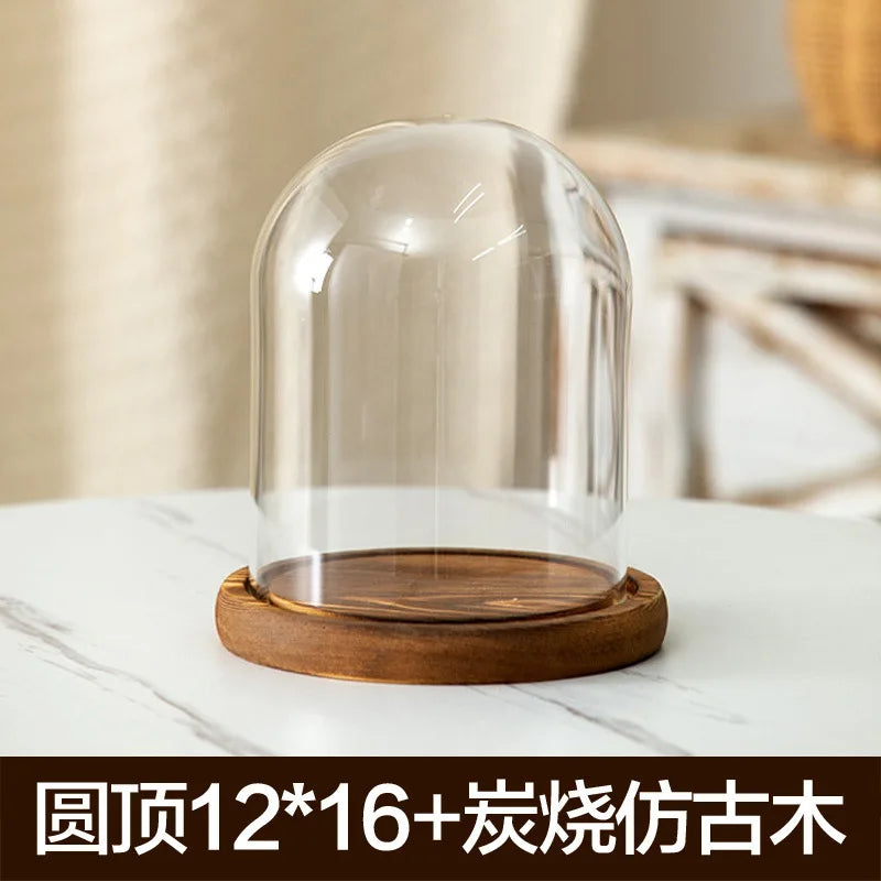 Glass aromatherapy candle holder with a wooden base and dust-proof cover