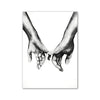 Black and white line art of two hands clasped together