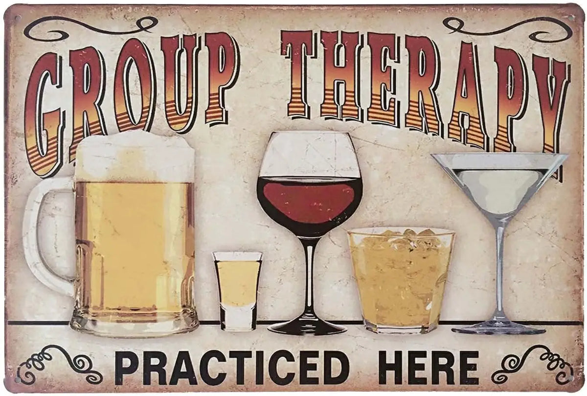 A retro metal sign decoration featuring the text GROUP THERAPY and PRACTICED HERE with illustrations of beer, wine, and a coc