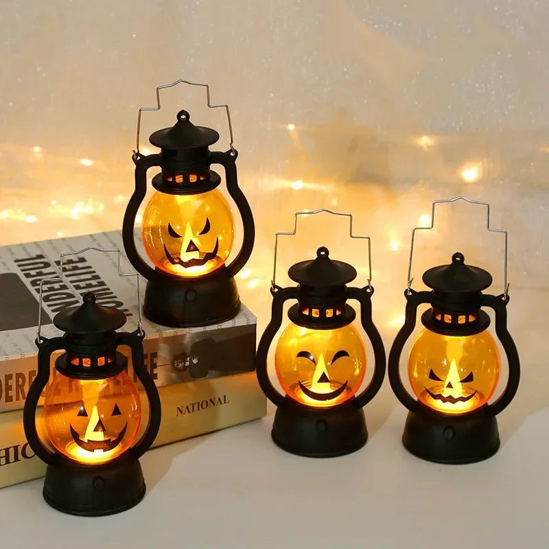 A set of three DIY Halloween pumpkin lanterns with LED projection effects displayed on a white surface.