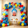 A balloon arch garland featuring blue, yellow, and red balloons shaped like a cartoon clown for a party decoration.