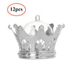 A set of twelve clear glass gold crown candy boxes.