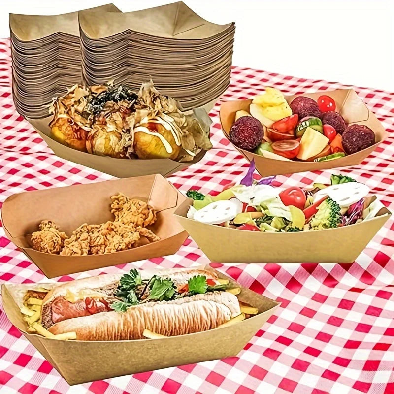 A collection of food items like pastries, fried chicken, and salads served in brown kraft paper disposable trays.