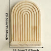 A light wood geometric wall shelf with a rounded arch design, measuring 29.5cm high and 19.5cm wide.