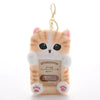 A fluffy orange and white cat keychain featuring a photo card holder.