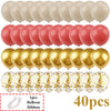 Ein Set von 40 Latexballons in verschiedenen Farben, darunter Weiß, Pink und Gold, sowie eine Rolle Schleifenband.