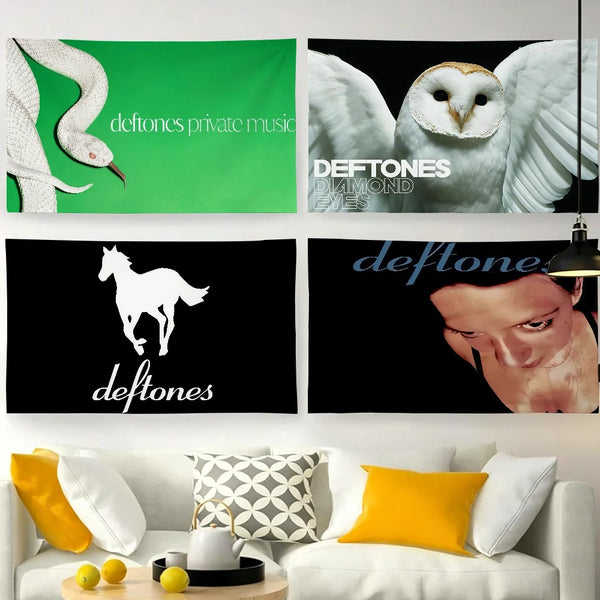 A wall decor display featuring flags and photographic prints of the Deftones band.