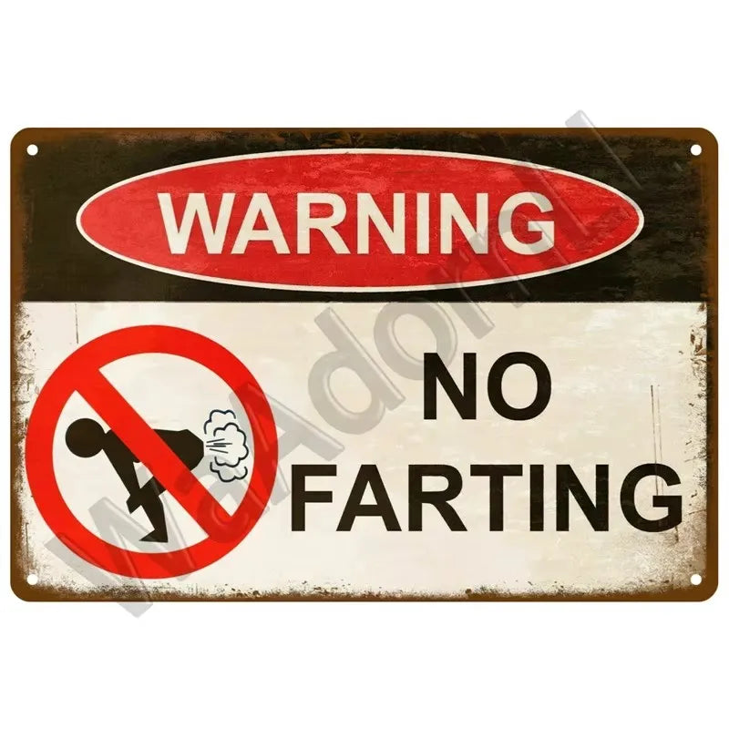 Vintage industrial sign with a red oval warning and a circle prohibiting farting