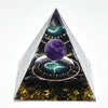 Handmade resin orgonite pyramid featuring a purple stone, natural obsidian, and a copper coil.