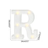 A white alphabet letter R light with warm white LED illumination.