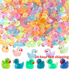 A collection of colorful luminous mini duck figurines in various shades and sizes for fairy gardens.