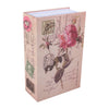 A pink-toned dictionary-style box with decorative stamps and text on the cover.