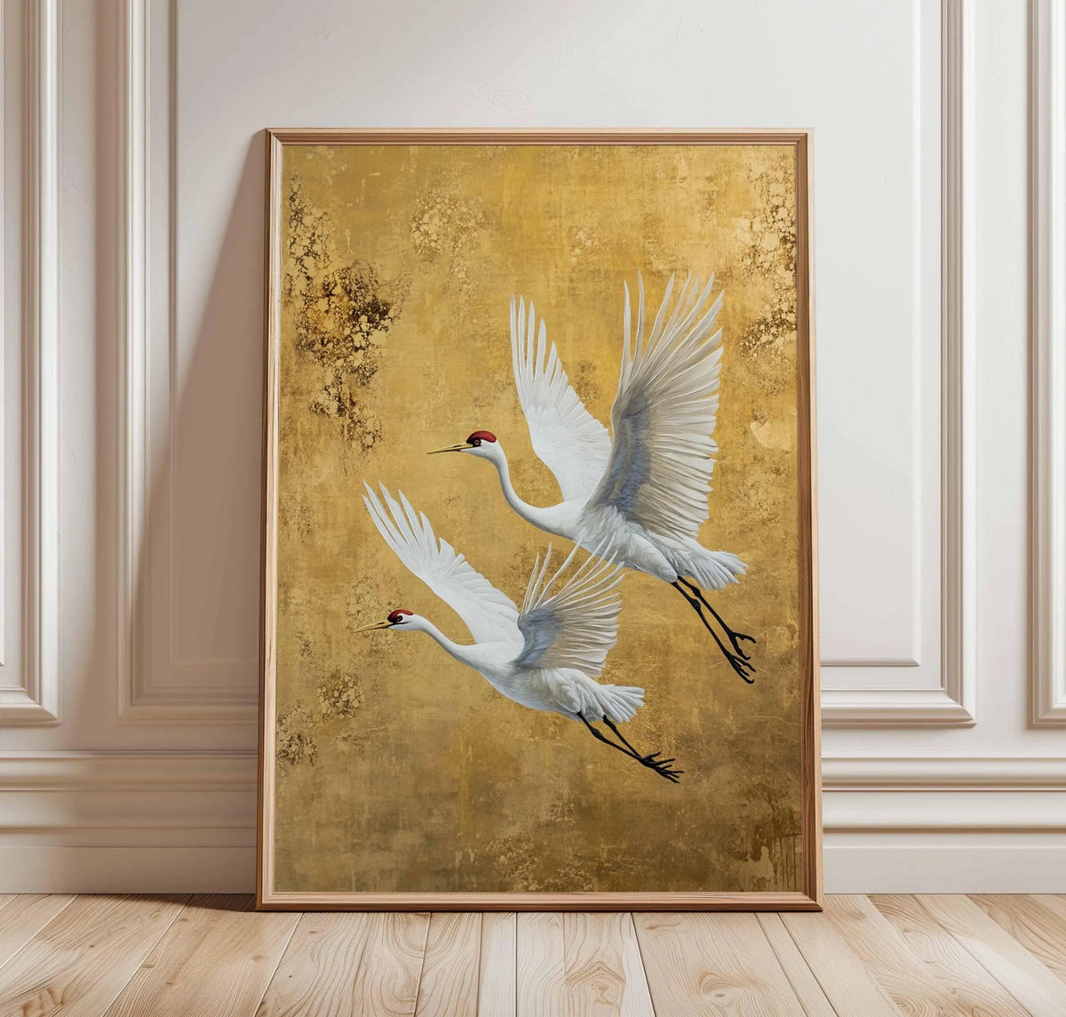A vertical canvas print featuring two white cranes in flight against a golden textured background.