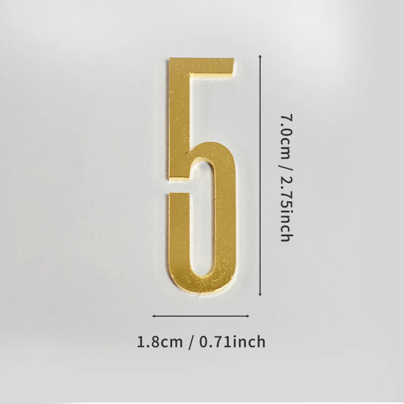 A polished gold house number 5 with self-adhesive backing, measuring 7.0cm or 2.75 inches tall.