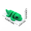 A bright green 3D printed cartoon animal figurine, possibly a lizard or gecko, shown with dimensions.