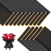 Black decorative flower wrapping paper with gold edges shown in a fan-like arrangement.