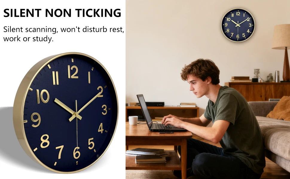 A modern blue quartz wall clock with a gold rim is displayed next to a young man working on a laptop.