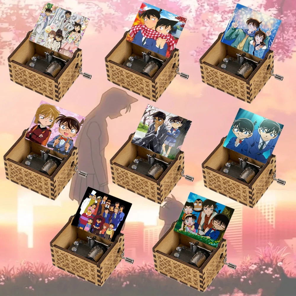A collection of Detective Conan anime music boxes in wooden holders with various figures and music discs.