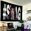 لافتة سوداء تحمل نصاً أبيض '#SAG' وصورة لشخص.