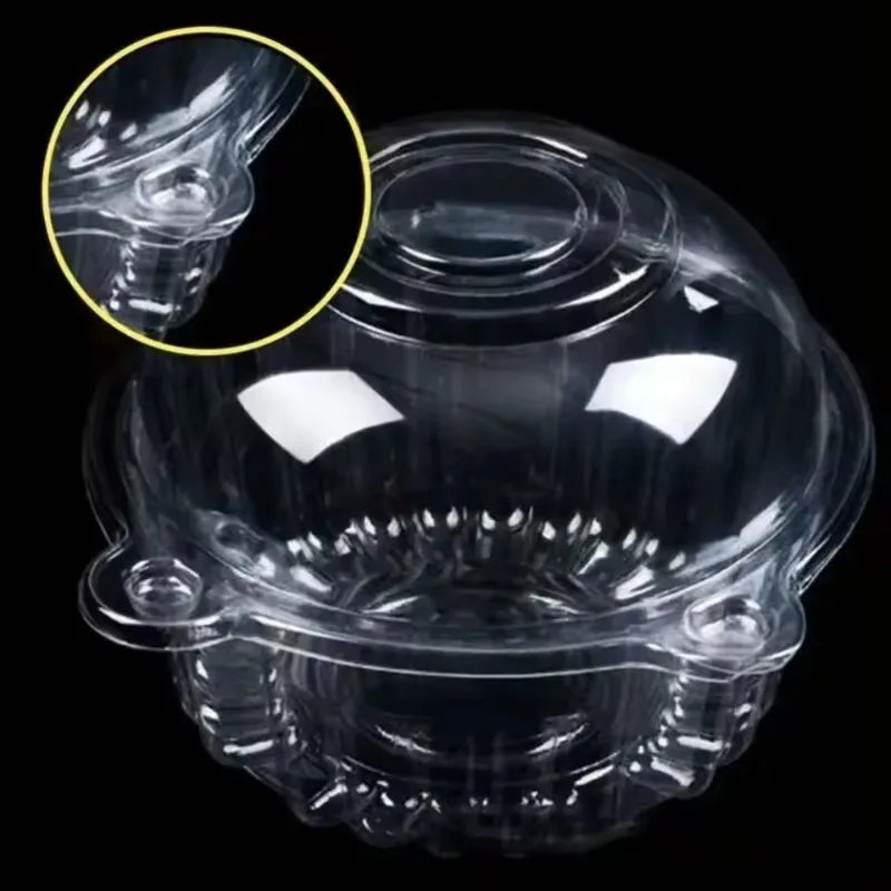 Clear plastic cat head shaped cake box with a lid shown from above and a close-up of the lid detail