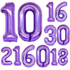 A set of purple foil number balloons spelling out 101630 and 216018.