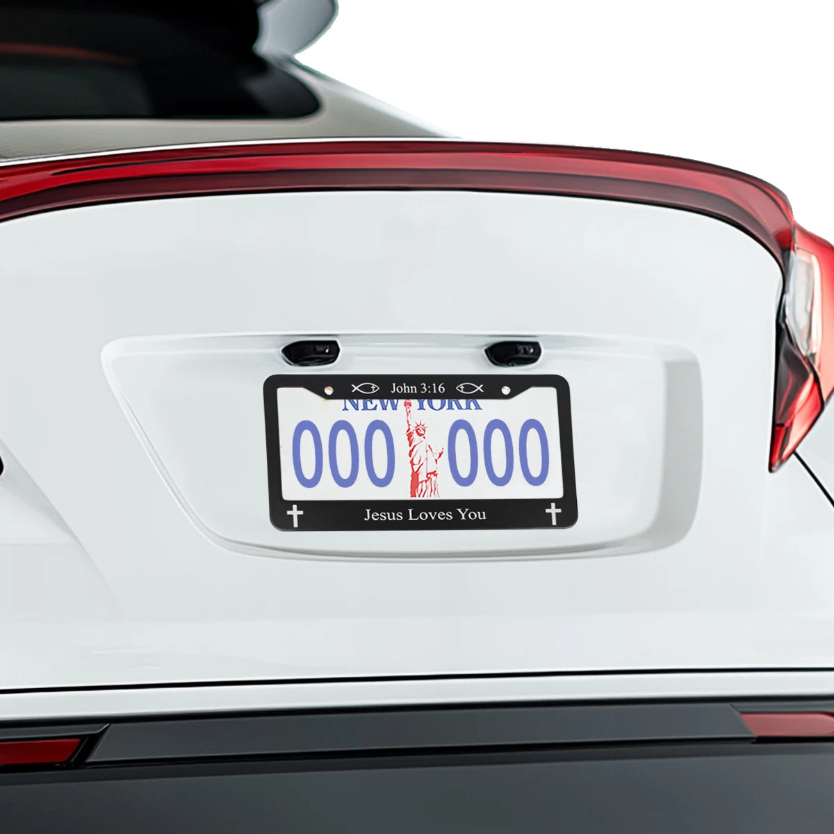A white car's license plate frame featuring a New York plate and the text Jesus Loves You