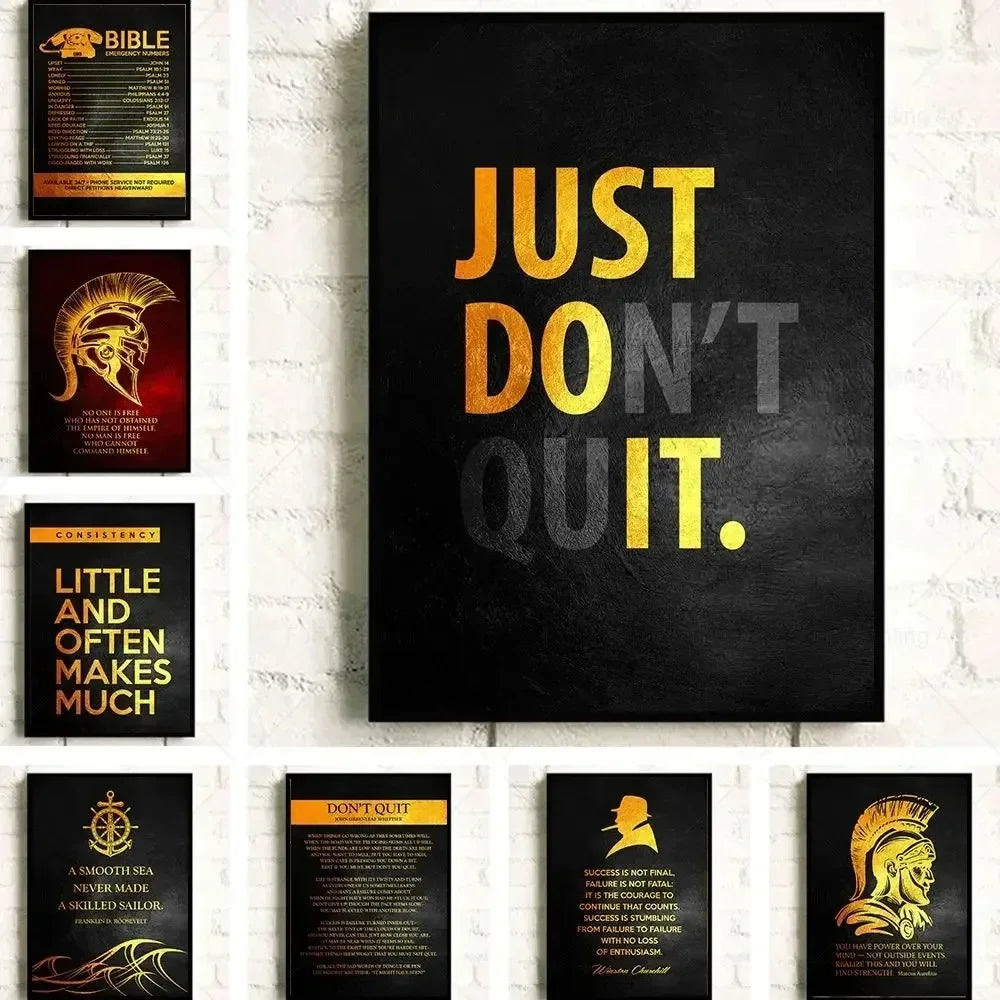 A gallery wall featuring four motivational quotes on black canvas art with gold lettering.