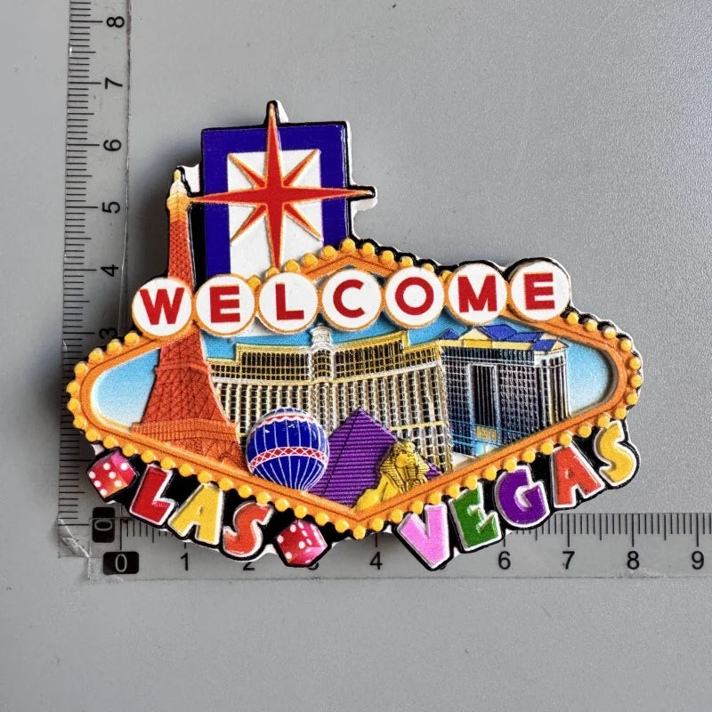 A set of iconic U.S. city fridge magnets featuring a welcome sign and Las Vegas elements.