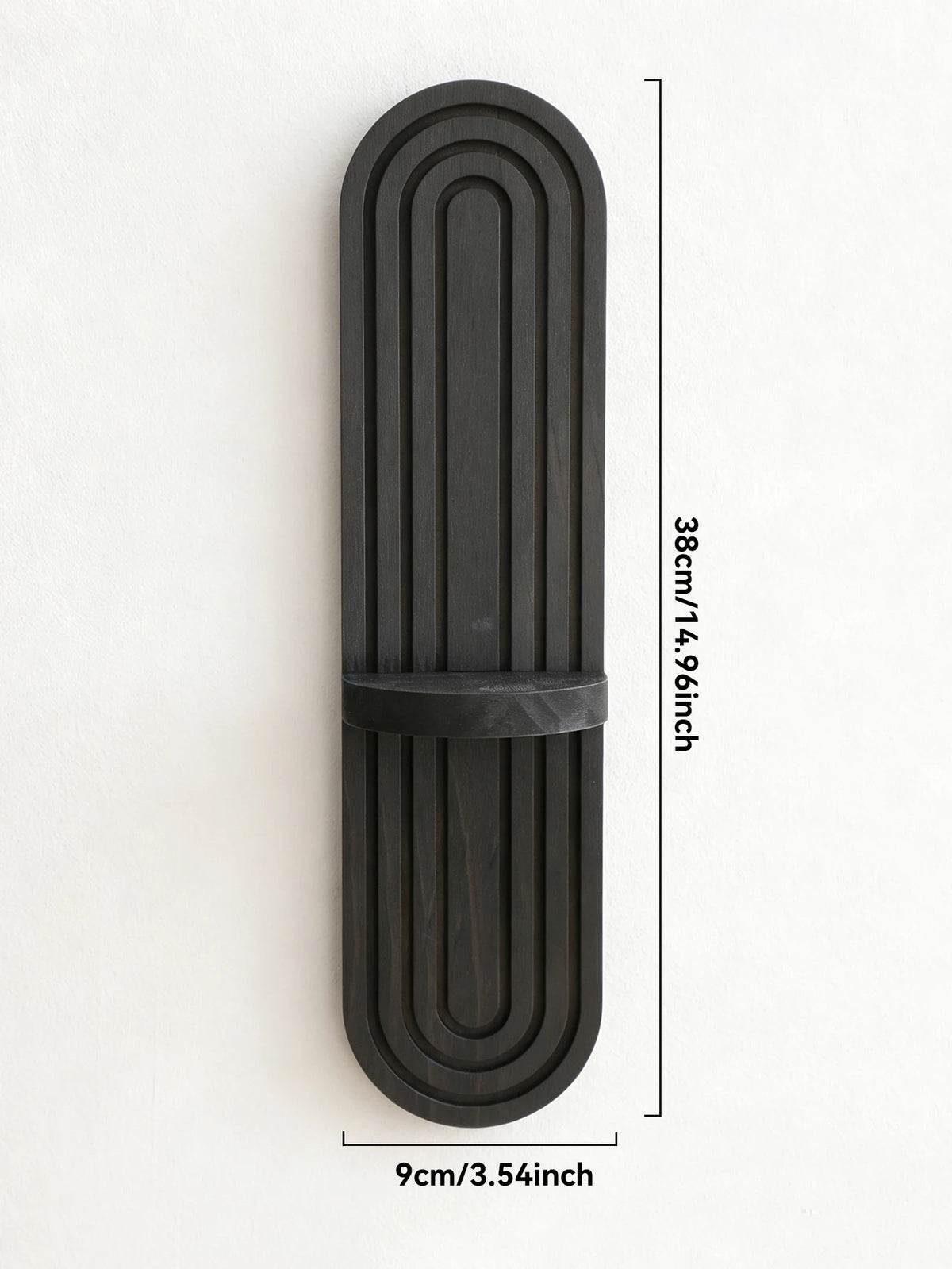 A vertical, dark wood wall shelf with a rounded arch design and ribbed texture.