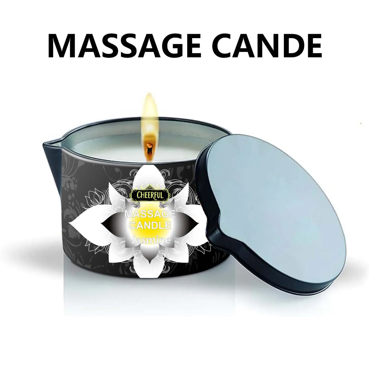 A massage candle in a tin with a lit wick, featuring a decorative floral design.
