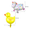 A yellow rubber duck decoration with a long neck and a pink and green striped unicorn head.