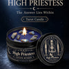 A dark tarot candle labeled The High Priestess with crystal stones and a lit wick, set against a dark background.
