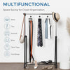 A black multi-functional hanger system with belts, ties, scarves, bras, tank tops, and handbags hanging on a rod.