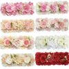 A collection of artificial silk rose flower panels in shades of pink, cream, and white.