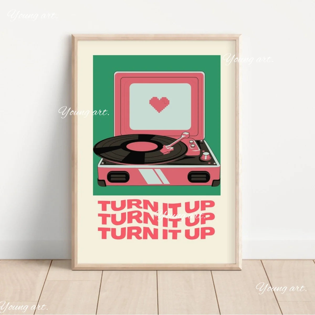 A framed canvas art print featuring a pink retro cassette player with a vinyl record and the text TURN IT UP repeated below.