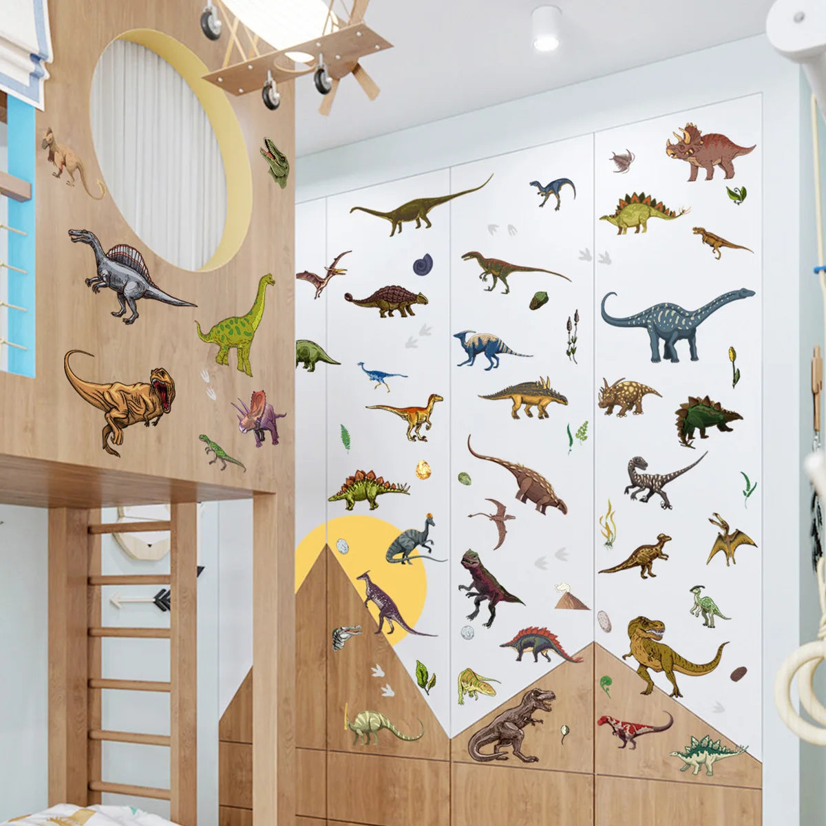 A wooden shelf unit displaying glow-in-the-dark dinosaur wall stickers for kids' rooms.