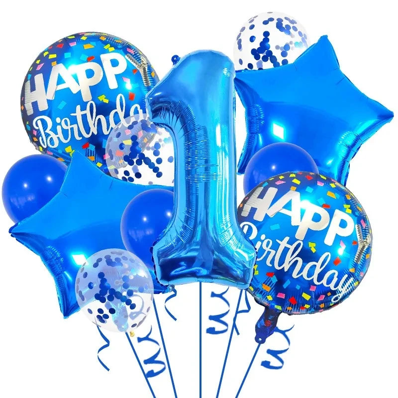 A set of navy and gold foil balloons shaped like the number one and a star for a birthday celebration.
