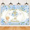 A white photography backdrop featuring blue roses, gold accents, and a golden cross for a First Communion theme.