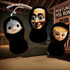 A transparent mesh full-face mask featuring a funny character with large eyes and a smiling expression.