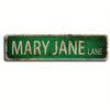 A vintage green metal street sign with the text MARY JANE LANE, showing signs of rust and age.